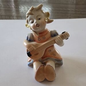 Vintage Ceramic Figurine with Guitar